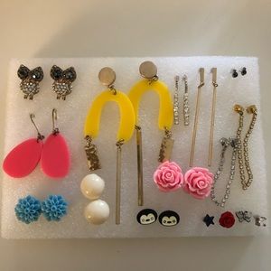 12 pairs of earrings + 4 single studs